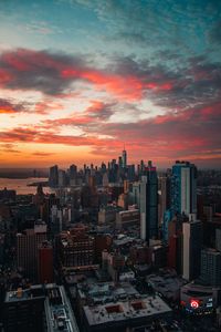 View of cityscape against sky during sunset