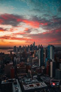 View of cityscape against sky during sunset