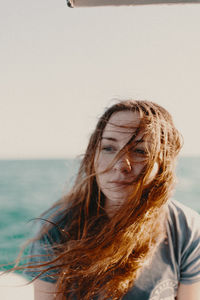 Portrait of young woman on beach