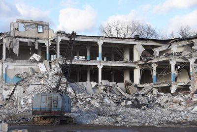 Abandoned building against sky