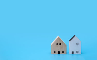 Close-up of building against blue sky