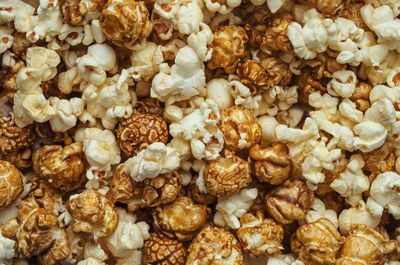 Sweet and salty popcorn close-up, background and texture