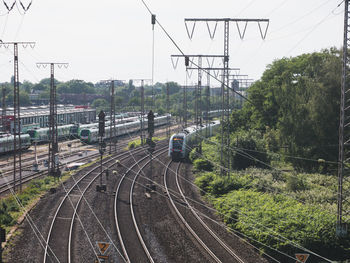 Train on railroad tracks against sky