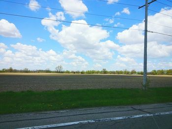 View of landscape against cloudy sky