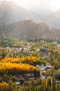 High angle view of townscape and mountains