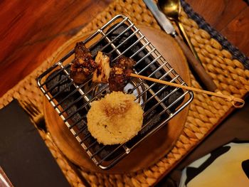 Close-up of food on barbecue grill