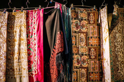 Clothes hanging in store for sale in market