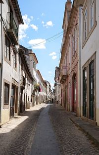 Narrow street between buildings