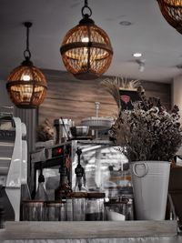 Close-up of illuminated pendant lights hanging from ceiling