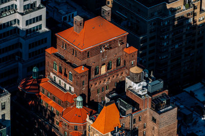 Low angle view of illuminated buildings in city