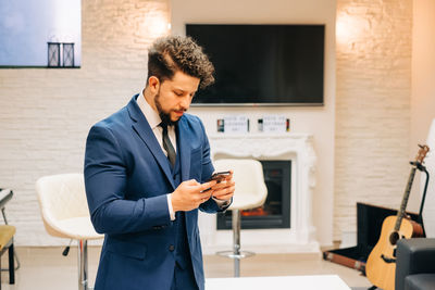 Young man using mobile phone