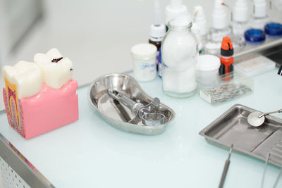 Close-up of dental equipment on table