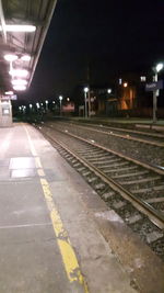 Railroad station platform at night