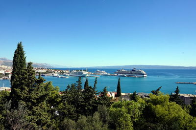 Scenic view of sea against clear blue sky