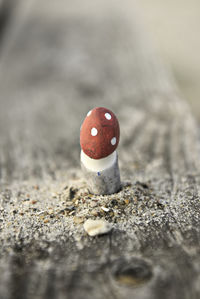 Close-up of cigarette smoking on wood