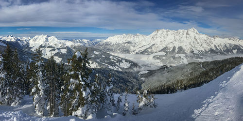 Scenic view of snowcapped mountains against sky