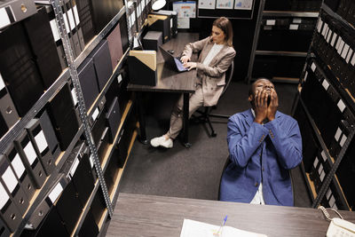 Low angle view of business colleagues working in office