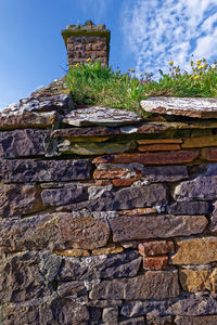 Low angle view of old building against sky