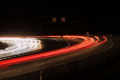 Light trails on road at night