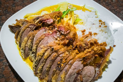 High angle view of food served in plate