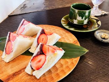 High angle view of fruits in plate on table