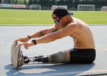 Side view of young man skateboarding