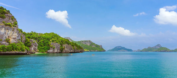 Panoramic view of bay against sky