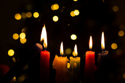 Close-up of burning candles