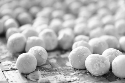 Close-up of pebbles on table