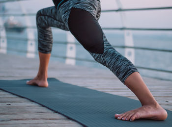 Low section of woman against blurred background