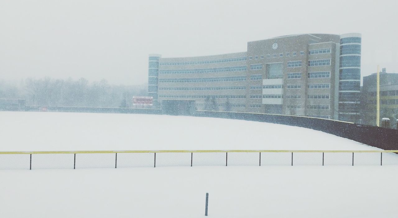 winter, snow, architecture, cold temperature, built structure, building exterior, season, weather, city, clear sky, covering, frozen, copy space, modern, railing, skyscraper, day, sky, building, office building