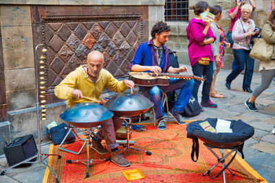 Group of people playing piano