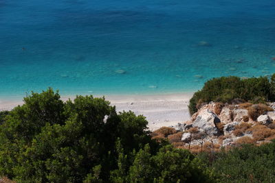 High angle view of sea against blue sky