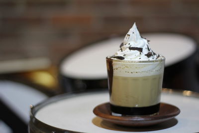 Close-up of coffee mocca on table