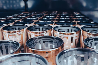 Lots of clear glass goblets. glassware production. empty glasses with decorative rims at the factory