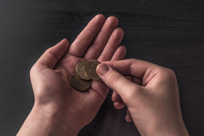 Close-up of hand holding hands