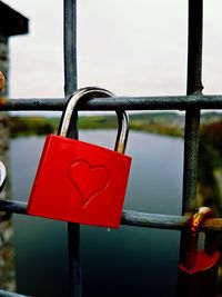 Close-up of padlocks on railing