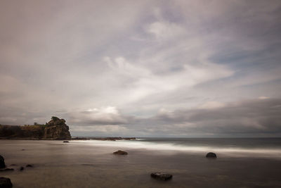 Scenic view of sea and cloudy sky