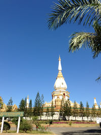 View of temple against clear blue sky