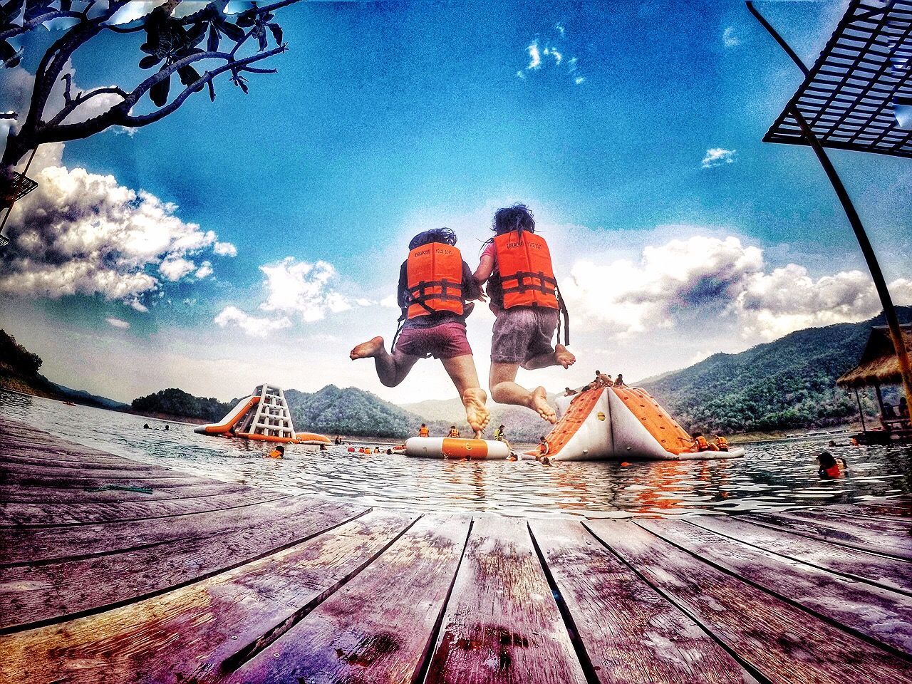 sky, cloud - sky, built structure, architecture, cloud, blue, building exterior, water, travel, lifestyles, transportation, mountain, leisure activity, tourism, travel destinations, outdoors, men, day