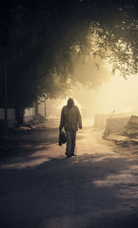 A lonely man walking down the street