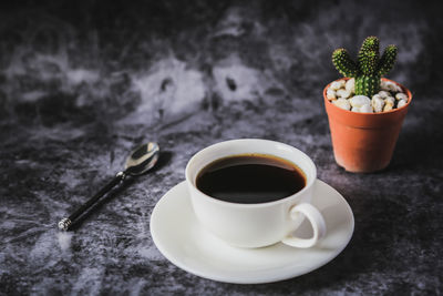 Cup of coffee on table