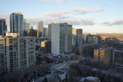 High angle view of buildings in city against sky