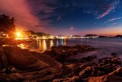 Scenic view of sea against sky at sunset