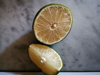 High angle view of lemon slice on table