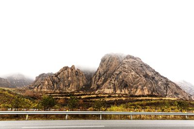 Scenic view of mountains against clear sky