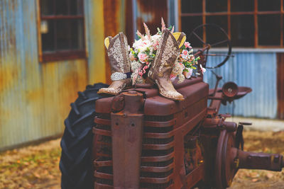 Tractor with bouquet and boots