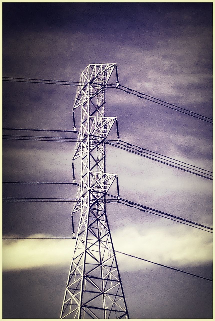 low angle view, electricity pylon, electricity, power supply, power line, technology, connection, sky, transfer print, fuel and power generation, silhouette, cable, auto post production filter, cloud - sky, dusk, cloudy, tall - high, cloud, built structure, outdoors