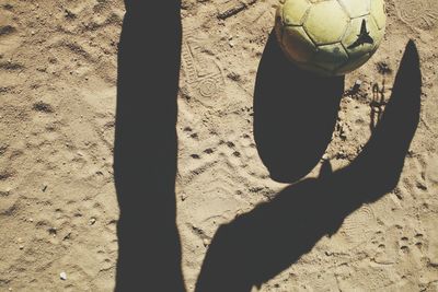 High angle view of soccer ball on beach