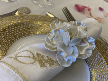 High angle view of white rose on table